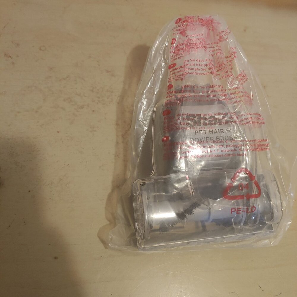 The Shark NV351 NV350 NV352 NV353 NV391 TURBO PET POWER BRUSH TOOL is a replacem